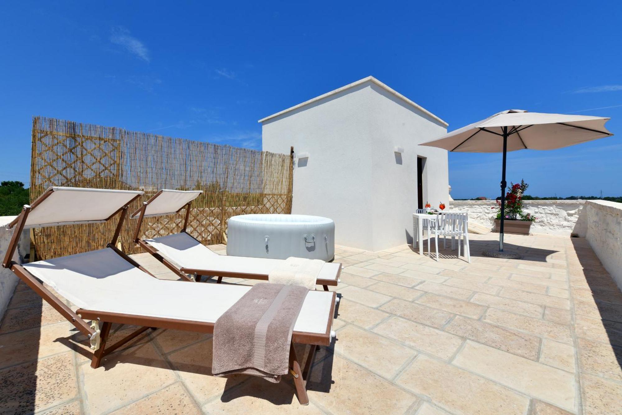 Lamarossa Trulli & Suites Antonelli Bagian luar foto